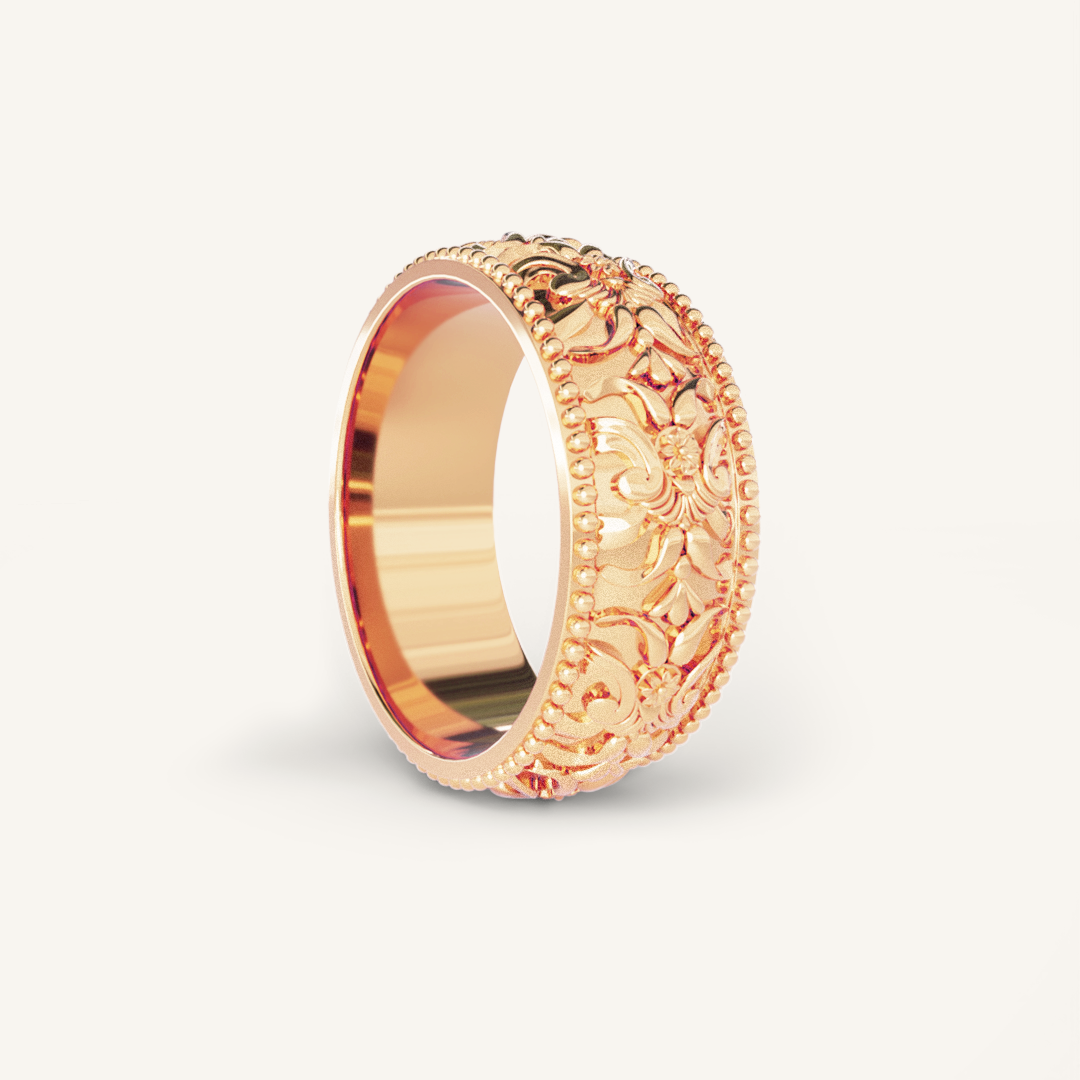 intricately designed statement rose gold ring inspired by Paris on white background