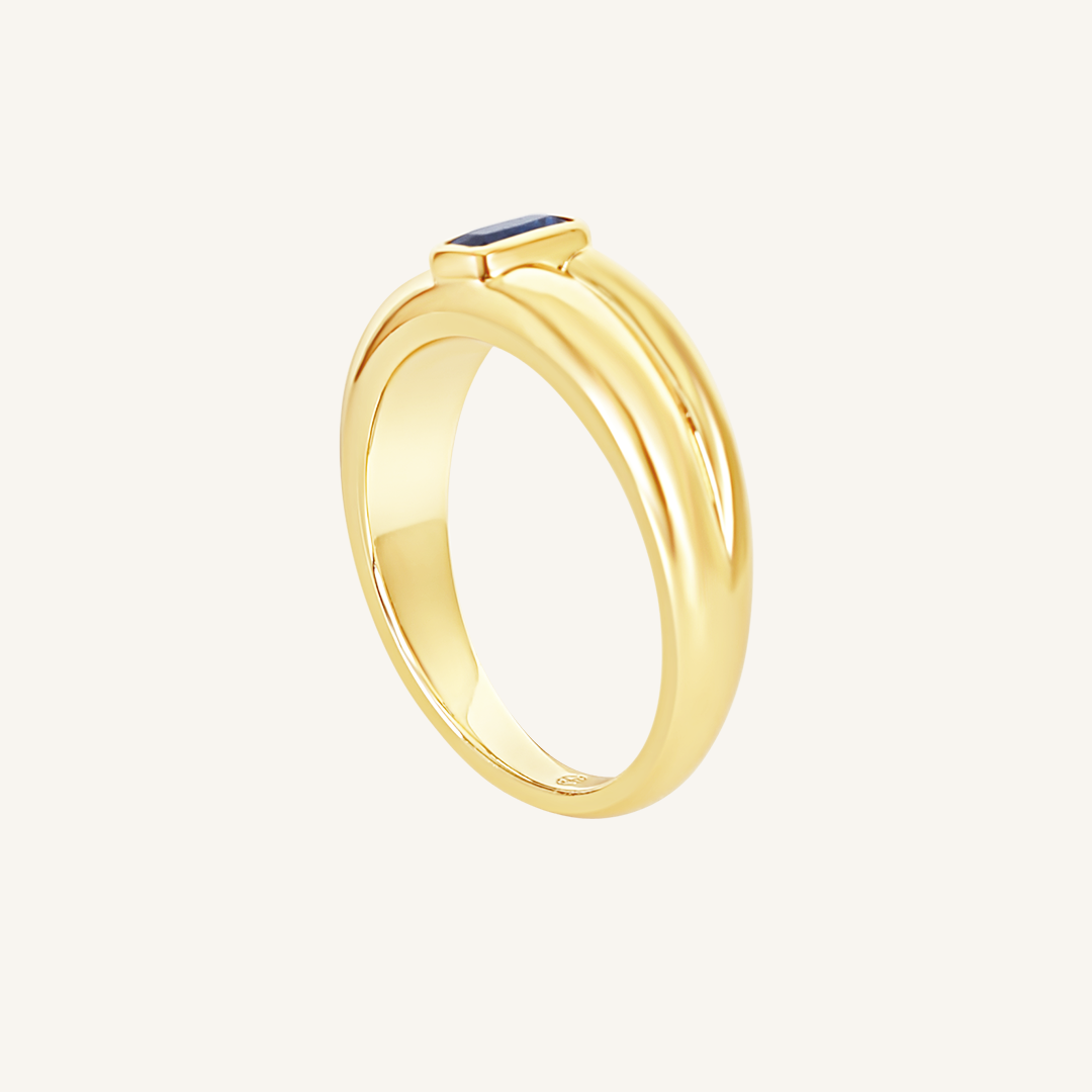 Gold ring with Navy blue cubic zirconia bezel set Inspired by the halls of Versailles on white background 