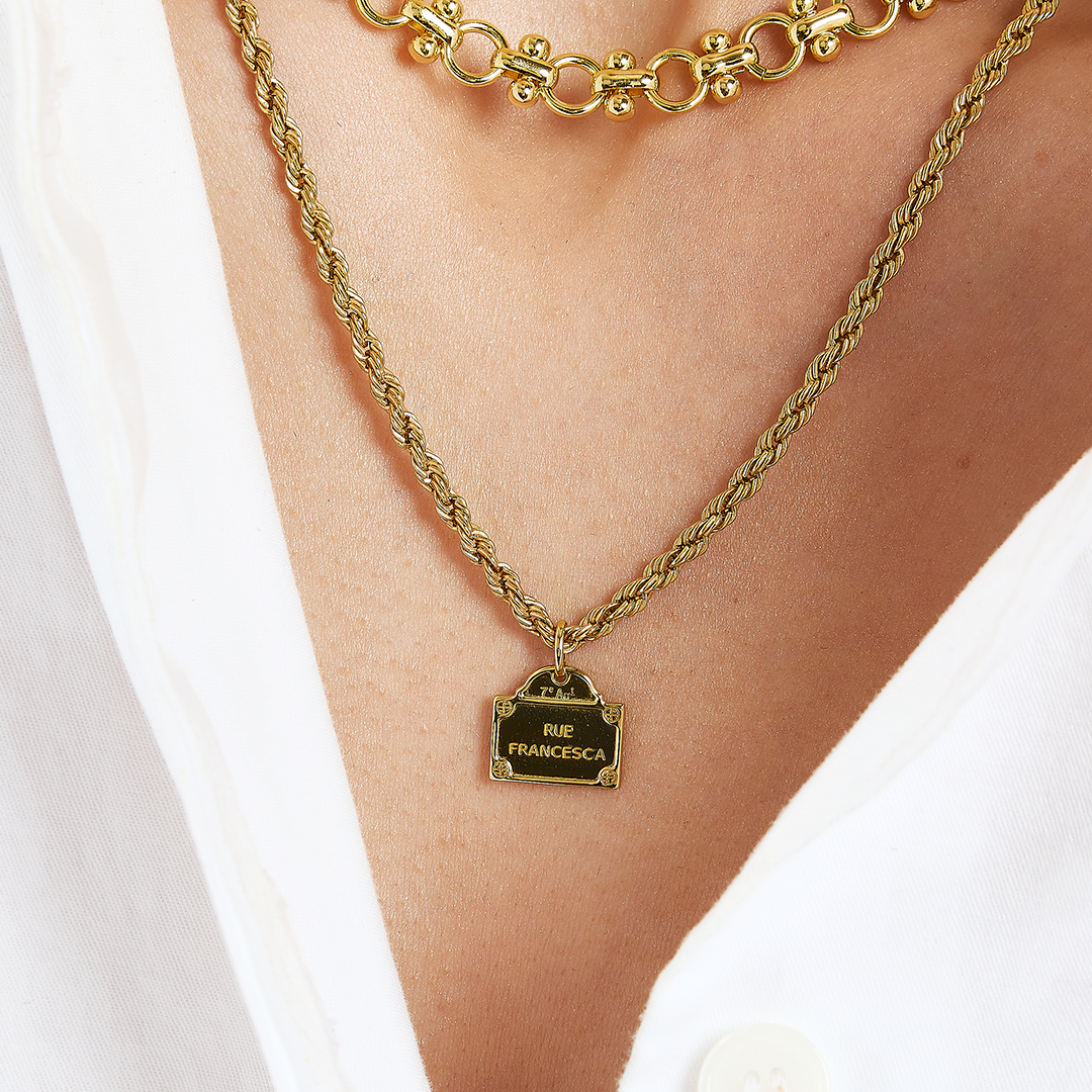 gold charm Inspired by the street signs in Paris on rope chain on the neck