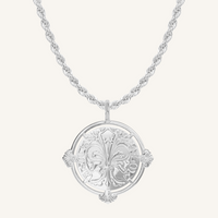 silver pendant featuring intricate patterns inspired by Palace of Versailles on silver rope chain a plain background